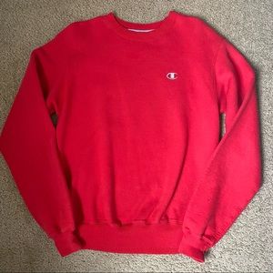 Champion red crewneck in size Small